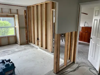 Wet drywall cut away above the flood line in a Venice, FL home