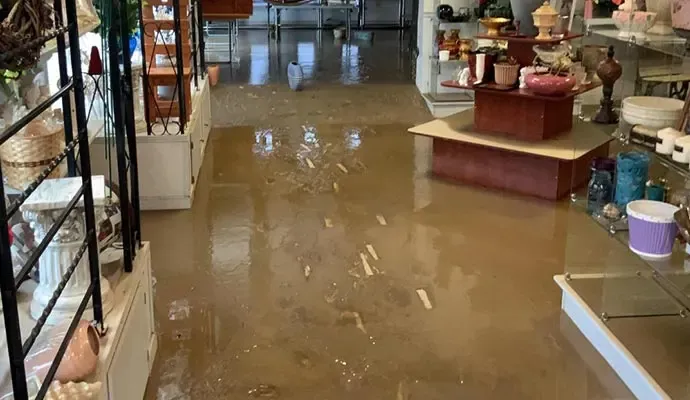 Floodwater across a retail shop floor in Venice, FL