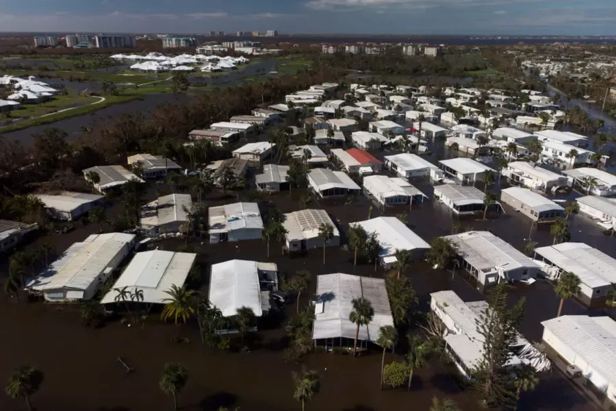 Floodwater around a manufactured-home community after a Gulf coast hurricane