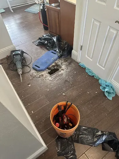 Tile floor opened to reach a slab leak in a Venice, FL home