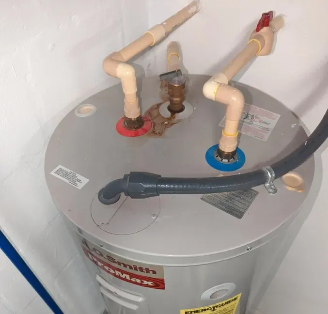 Tank water heater in a utility closet of a Venice, FL home